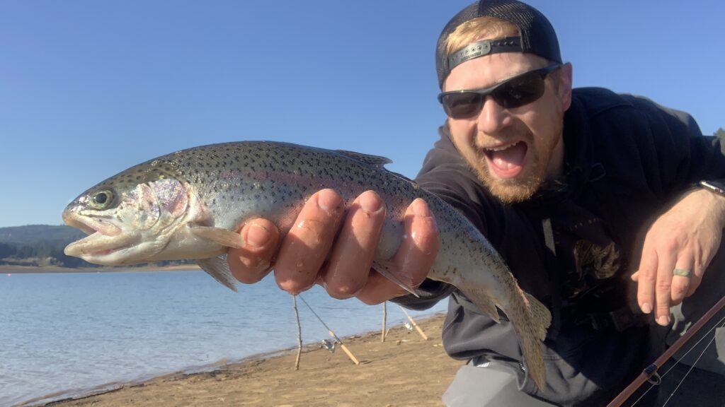 Holding up a big rainbow trout