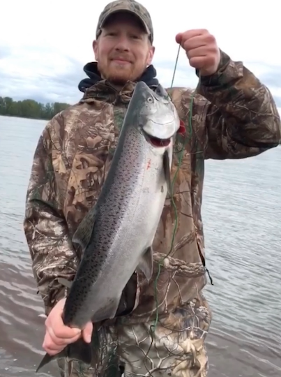 Will holding a spring chinook.